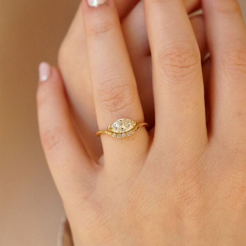 Floating East West Marquise Engagement ring