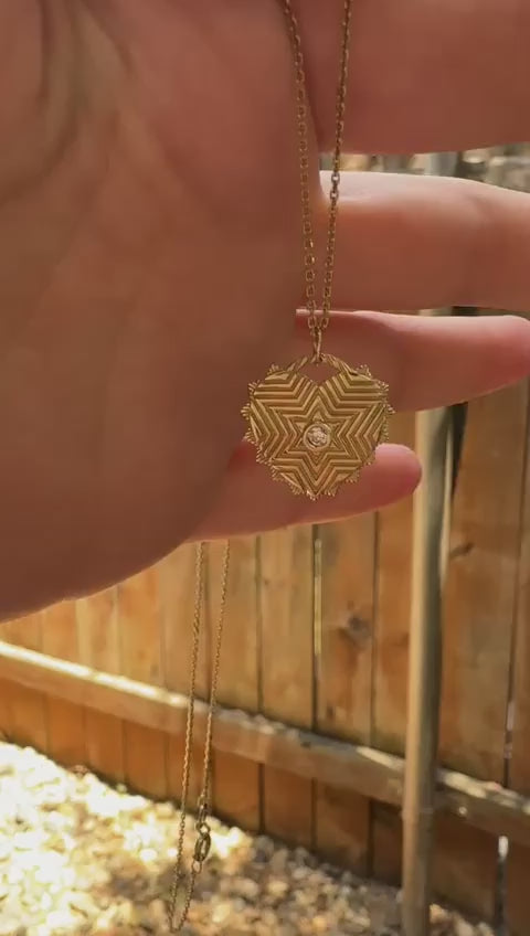 Video showcaseing Engraved Magen David Pendent on a hand.