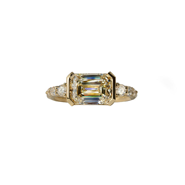 Deco Inspired Half Bezel East West Emerald Cut Diamond Ring